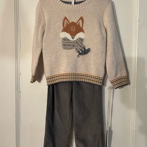 Rorie Whelan sweater and corduroy pants outfit